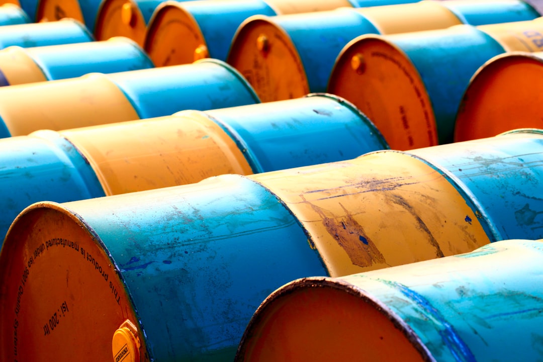 gold bars crude oil barrels ETF investment comparison