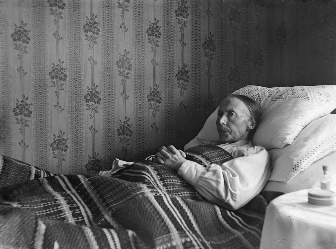 elderly person sleeping peacefully bedroom night