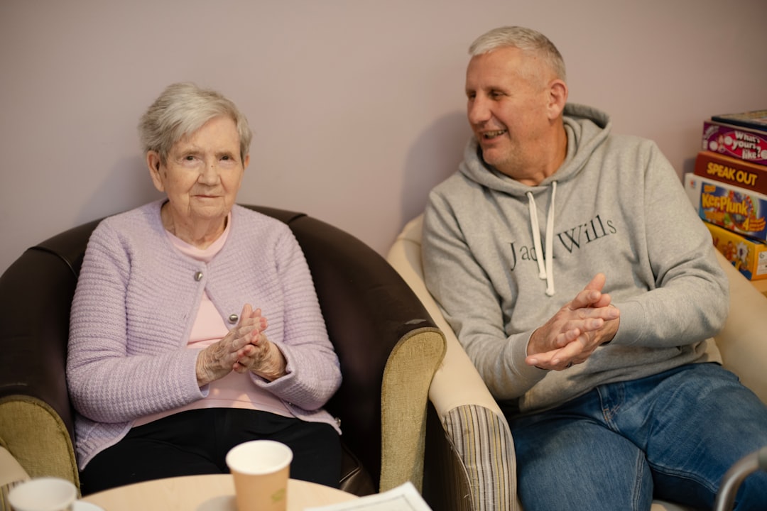 family caring elderly parent talking comforting home
