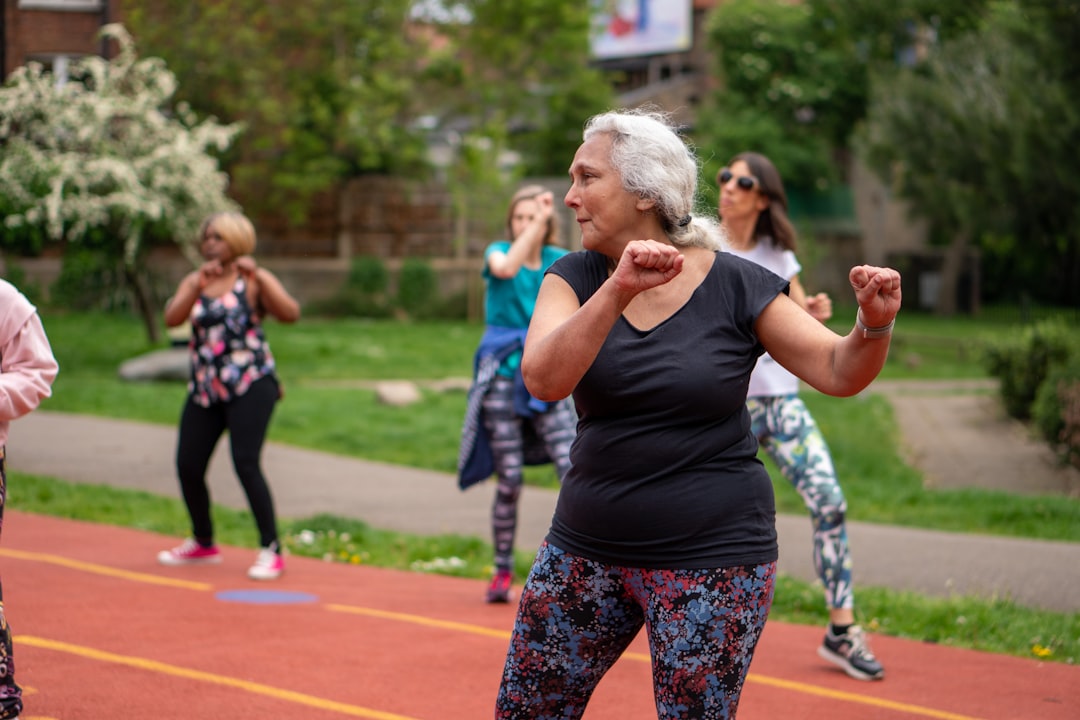 senior group exercise class, tai chi older adults, community fitness program