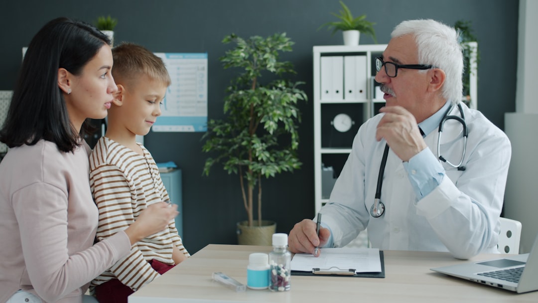 pharmacist explaining medication to elderly patient, drug interaction chart