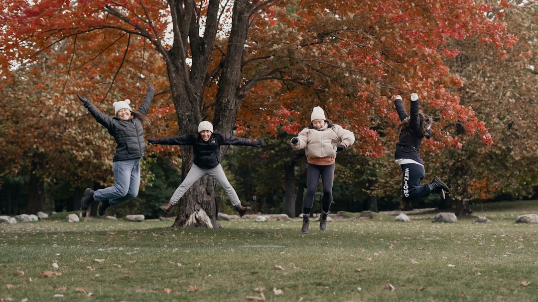 senior citizens outdoor group exercise resistance band balance training park