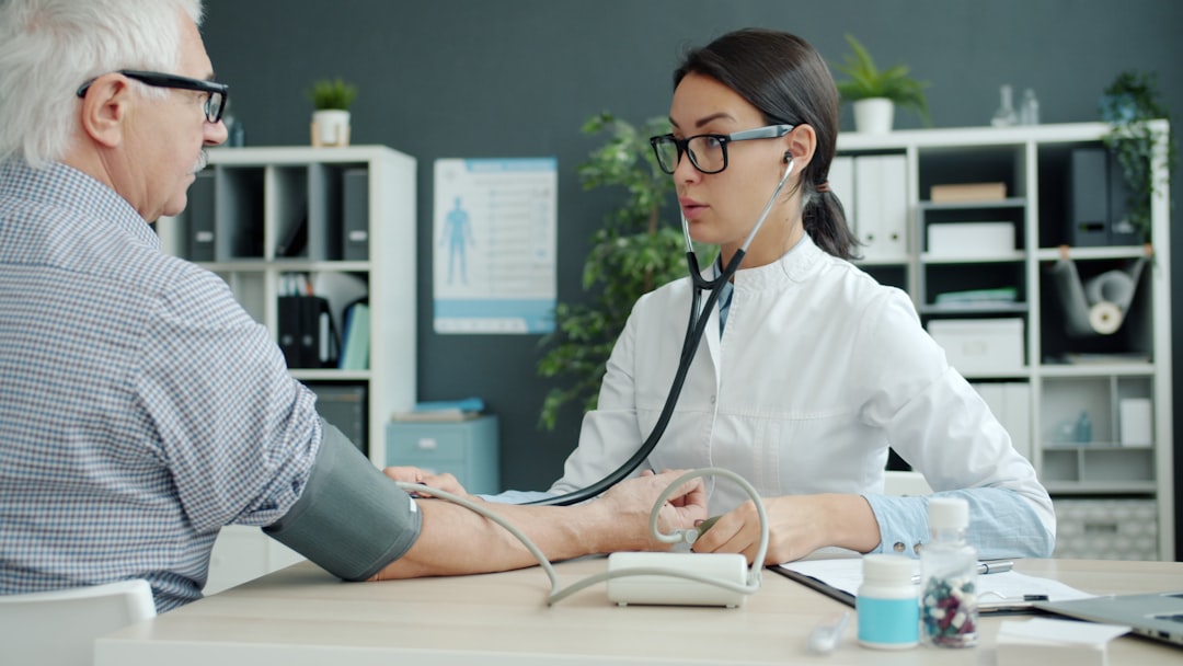 elderly health checkup, senior medical screening, doctor patient consultation